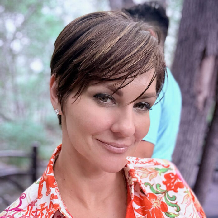 Portrait of certified colorist Larissa Wasko at LaRoc Salon, a hair salon in Phoenix, AZ, highlighting professional hair styling expertise